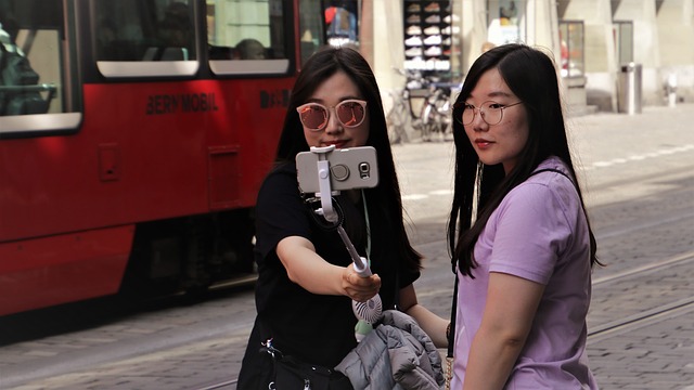 Tourists taking selfies